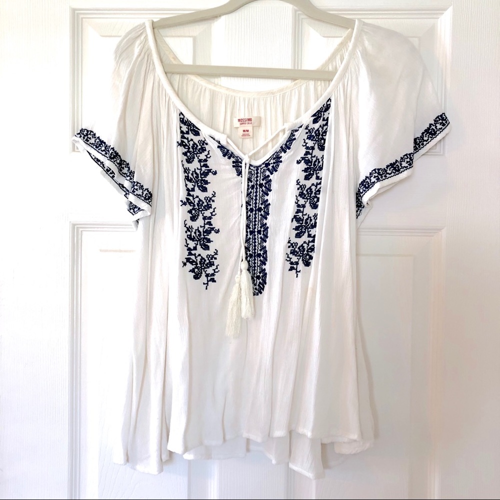 White Mexican style blouse with navy embroidery